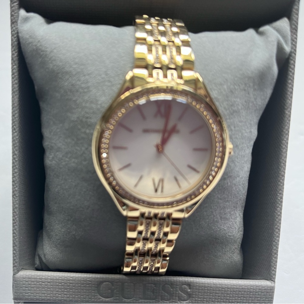 Michael Kor’s Gold-Tone watch with rhinestone embellishment. - Picture 2 of 5